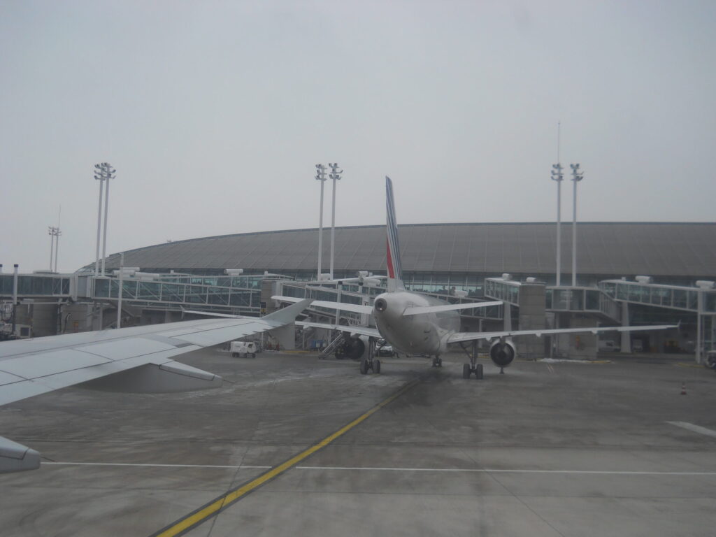 Air France aircraft parked at a Paris Charles de Gaulle terminal gate