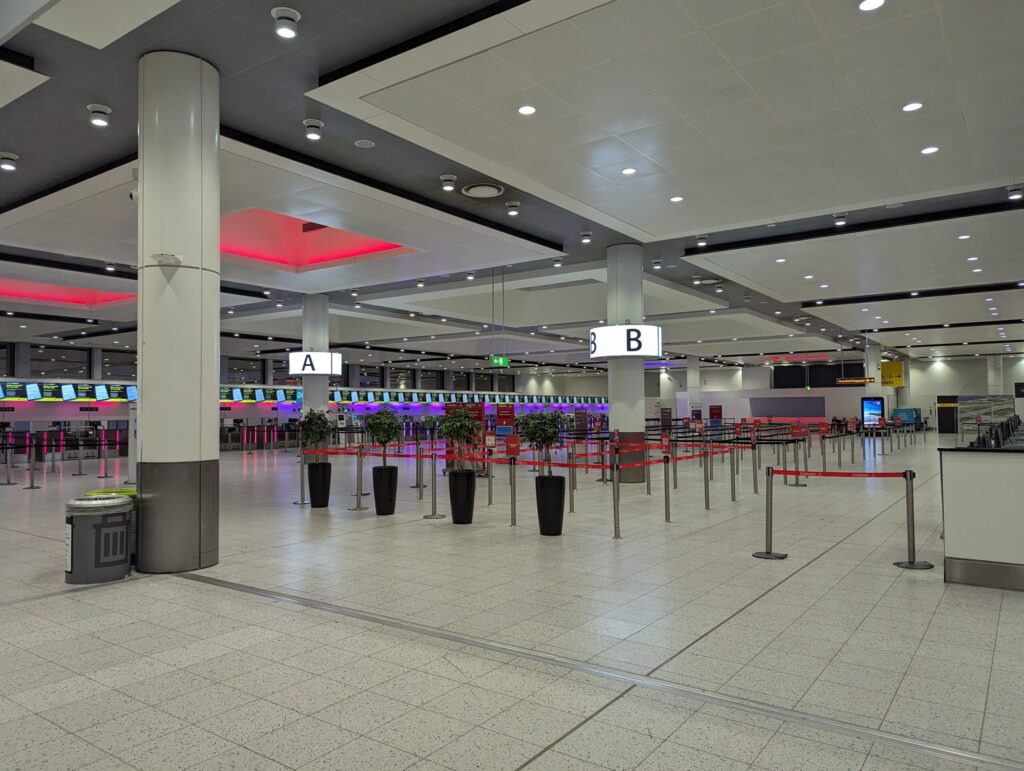 A Jersey Family Lost £5,000 Because an Airline Did Not Recognise Their Passport. Here Is How to Avoid It | Check-in zones A and B inside Gatwick Airport North Terminal with empty queue lanes