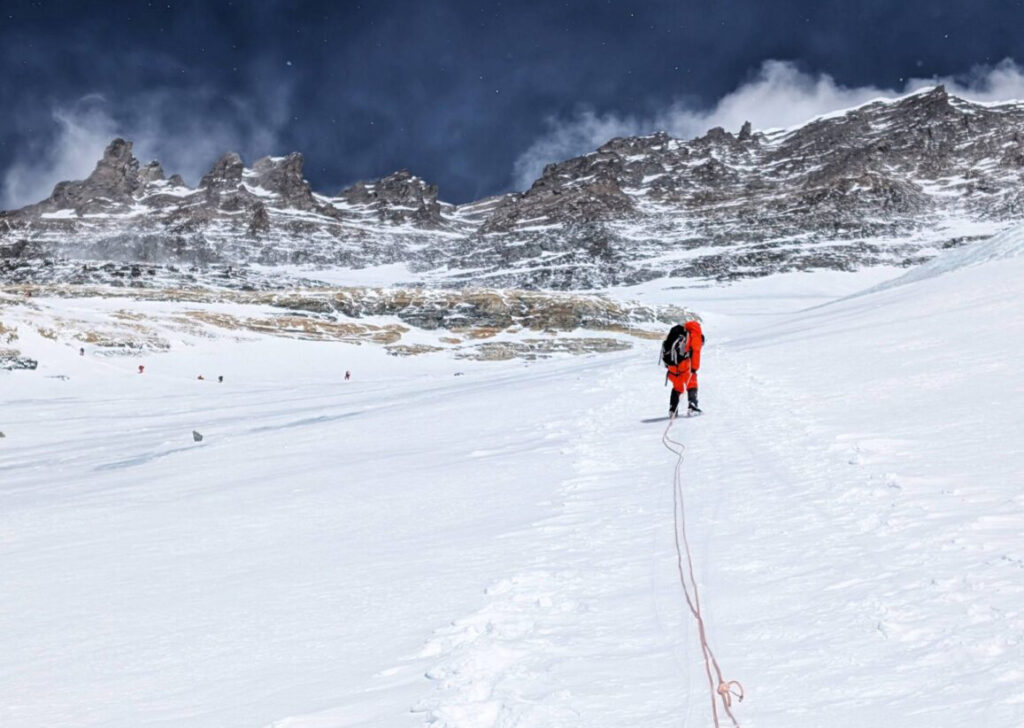 climbers at the Yellow Band limestone band Everest south col route