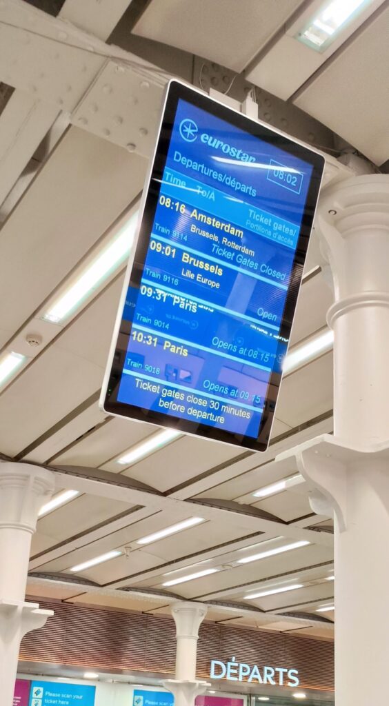 Eurostar digital departures timetable screen showing Amsterdam Brussels Paris trains St Pancras