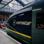 Genius Travels - Advenutre Travel Guides | Eurostar train nose at St Pancras International platform showing London St Pancras destination display