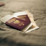 Polish EU passport and travel documents on fabric surface before holiday
