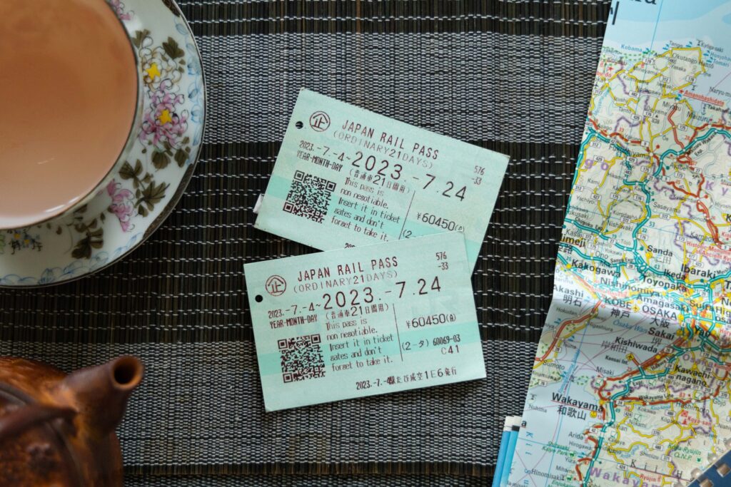 A Japan Rail Pass ticket showing validity dates beside a regional map