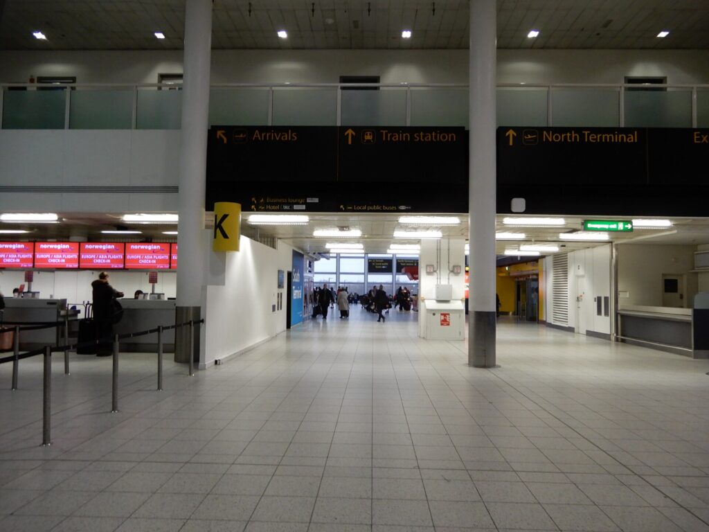 Gatwick South Terminal concourse immediately outside the railway station exit
