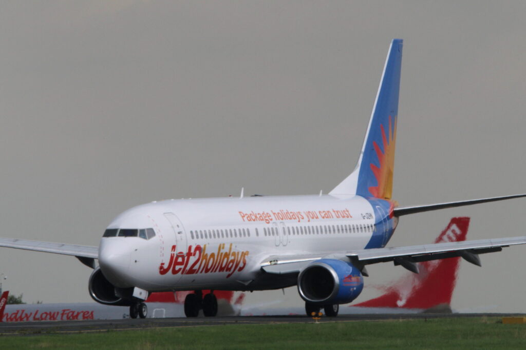 Jet2 Boeing 737-300 in white and orange livery at Leeds Bradford Airport