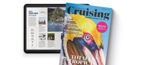 World of Cruising magazine cover with discount code offer