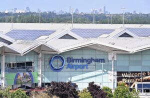 Birmingham Airport terminal exterior with planes on the tarmac