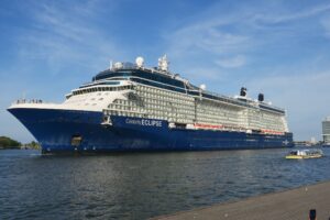 Celebrity Cruises ship at sea, Genius Travels discount codes