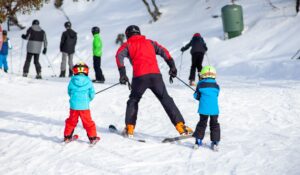 Neilson Holidays logo and active beach holiday scene for discount code offers