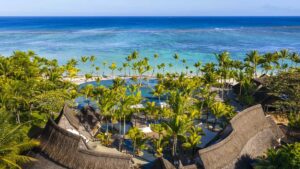 BeachComber Hotels & Resorts logo over a Mauritius beach resort scene