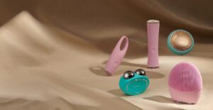 Foreo skincare device with discount code banner