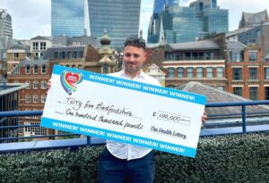 The Health Lottery GB logo with lottery balls thumbnail