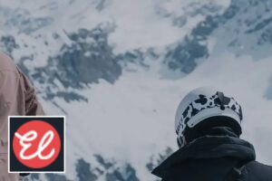 Erna Low Ski Holidays logo with a snowy mountain resort backdrop