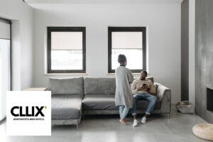 CLLIX Apartments and Hotels logo on a modern apartment balcony