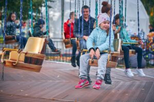 Family walking into a theme park with Attractiontix tickets ready to scan
