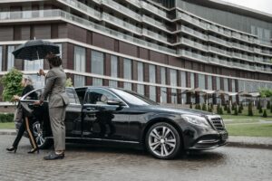 Mytransfers private airport transfer car waiting for passengers with luggage
