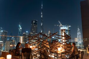 Paramount hotels Dubai rooftop infinity pool and Hollywood-themed room banner